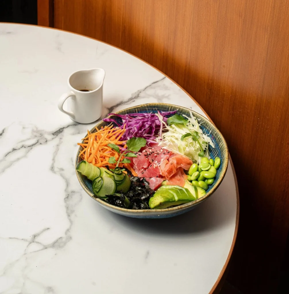 Fresh Poke Bowl with tuna, avocado, and vegetables at AT 06 Canggu Bali Title: Fresh and Healthy Poke Bowl at AT 06 Canggu