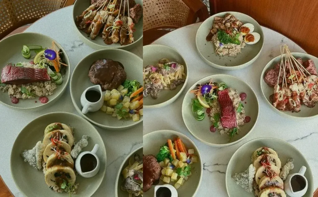 A vibrant, mouth-watering flat lay of healthy Asian fusion food at at06, a locally-owned Canggu restaurant. The table is laden with a feast of colorful and delicious dishes, including keto-friendly and vegan options, promising a wellness dining adventure.