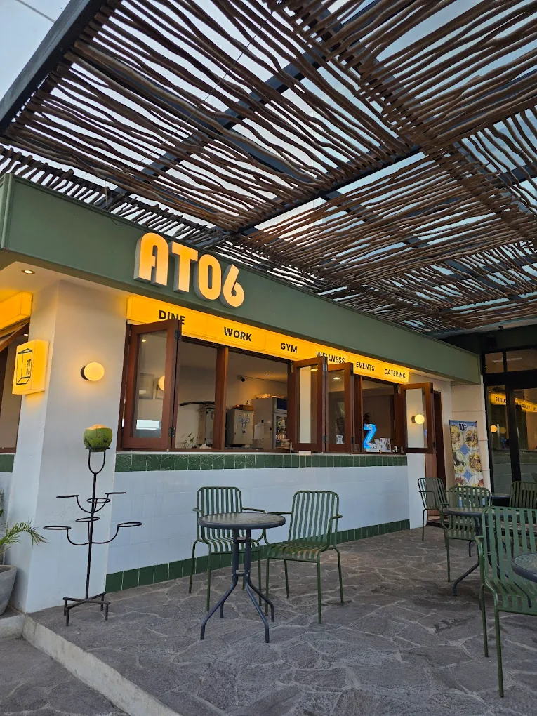 AT 06 Canggu Bali restaurant exterior with outdoor seating and bamboo roof design